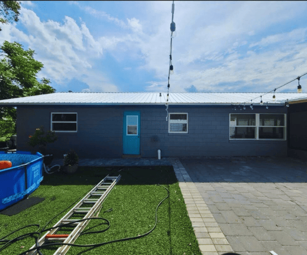 Front view of Sarasota home with professional exterior house painting.