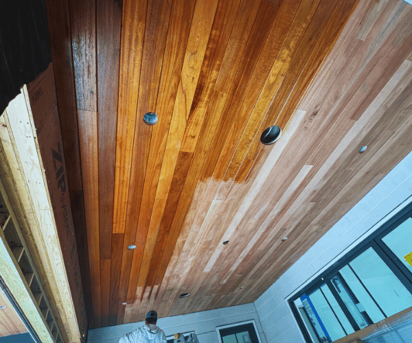 Roof maintenance and exterior painting project in Sarasota, Florida.